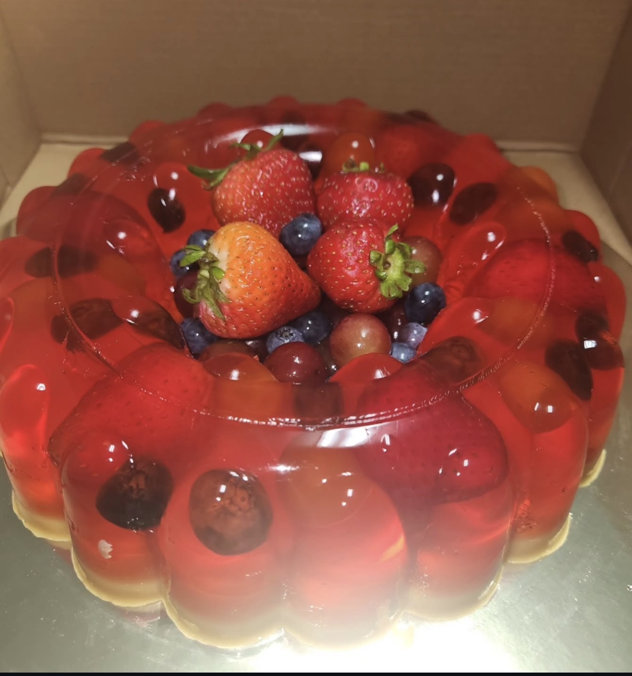 Strawberry gelatin with fresh fruit